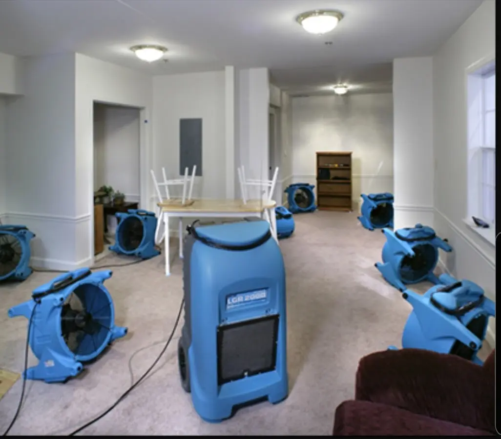 Air movers and dehumidifier setup for Water Damage Restoration in Indiantown