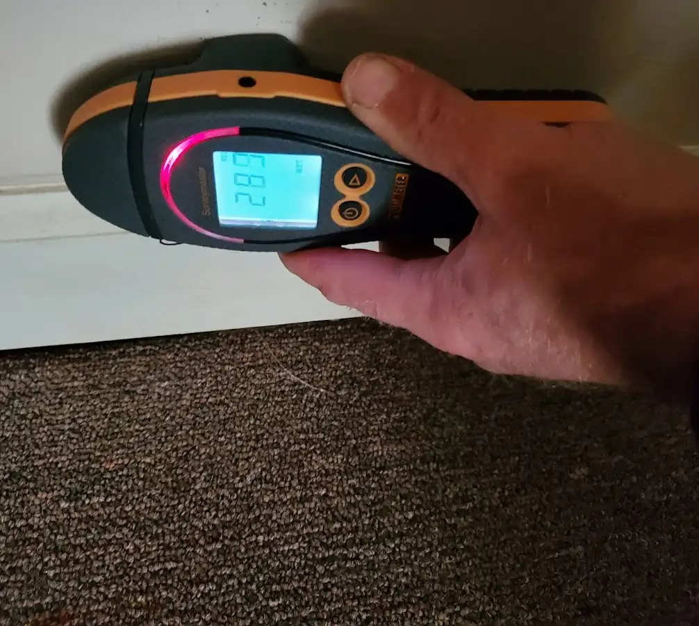 Moisture detection at baseboard during Mold Inspection & Testing in Indiantown